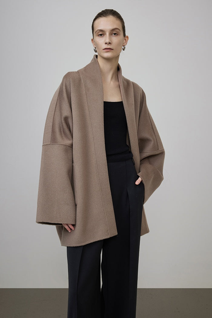 Sculpted Minimalist Wool Cape Coat