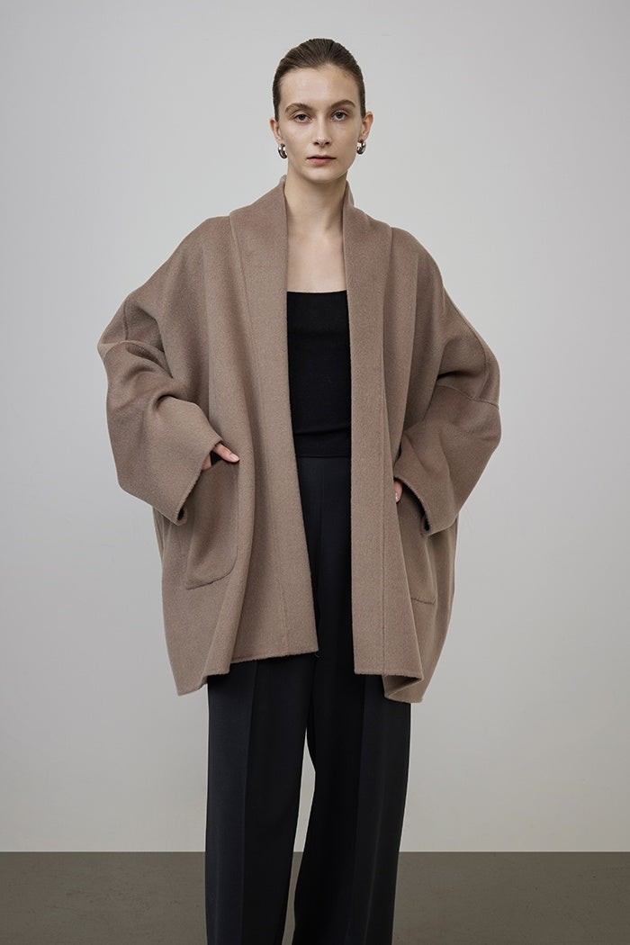 Sculpted Minimalist Wool Cape Coat