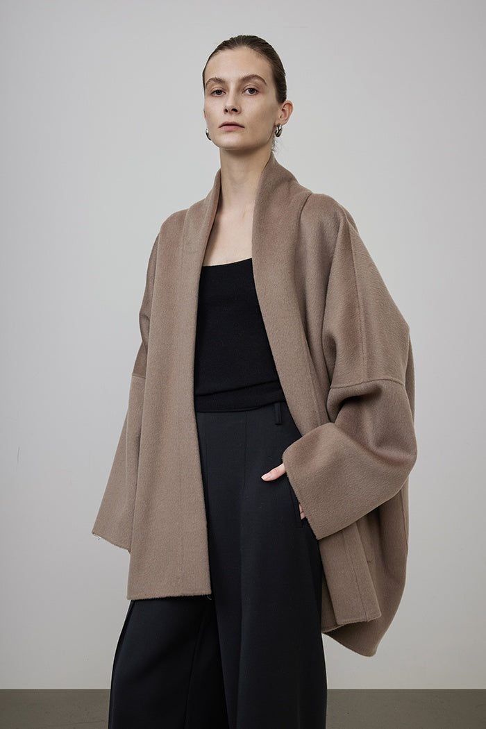 Sculpted Minimalist Wool Cape Coat