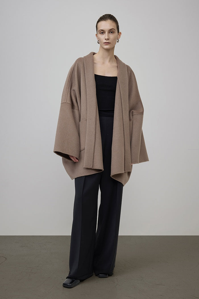 Sculpted Minimalist Wool Cape Coat