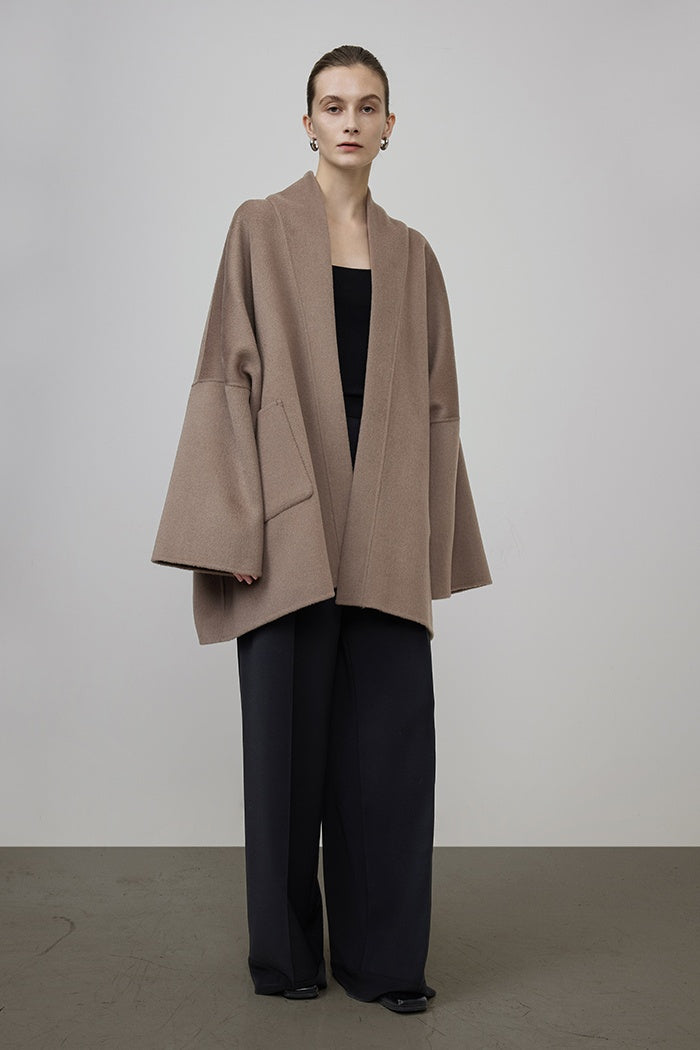 Sculpted Minimalist Wool Cape Coat