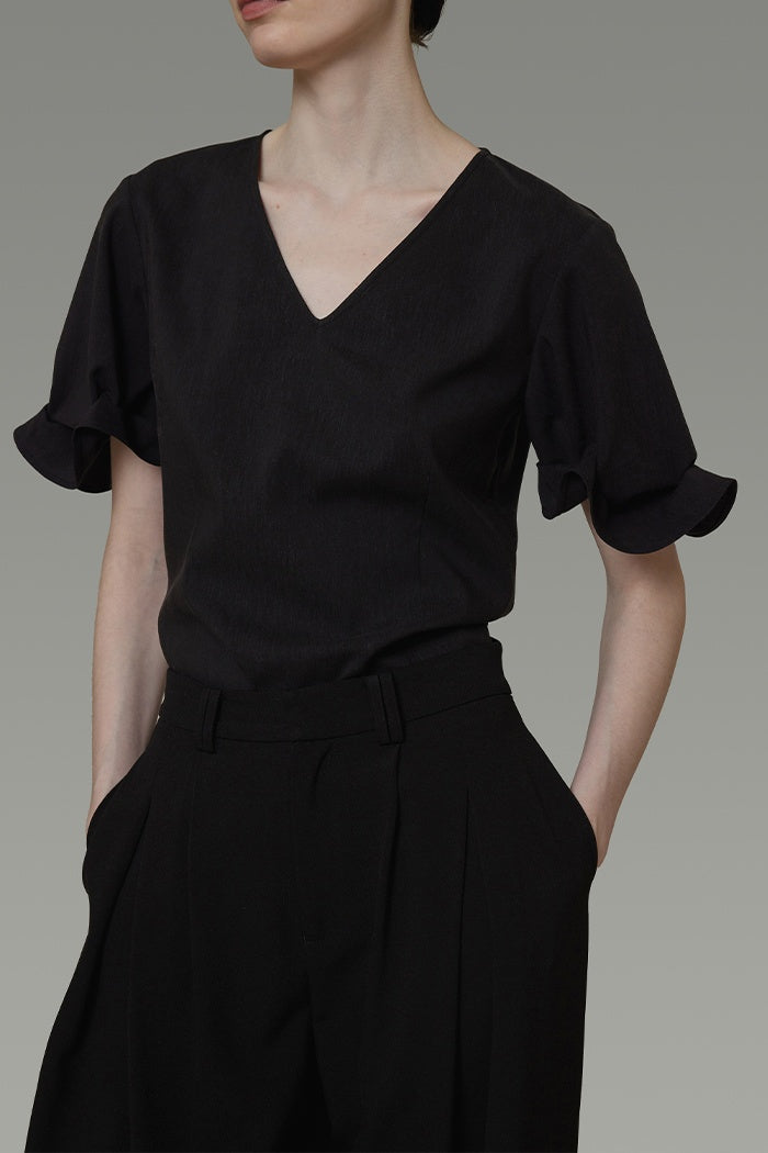 Architectural V-Neck Knit Top