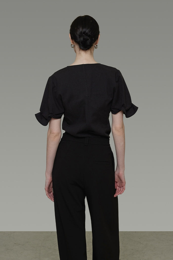 Architectural V-Neck Knit Top